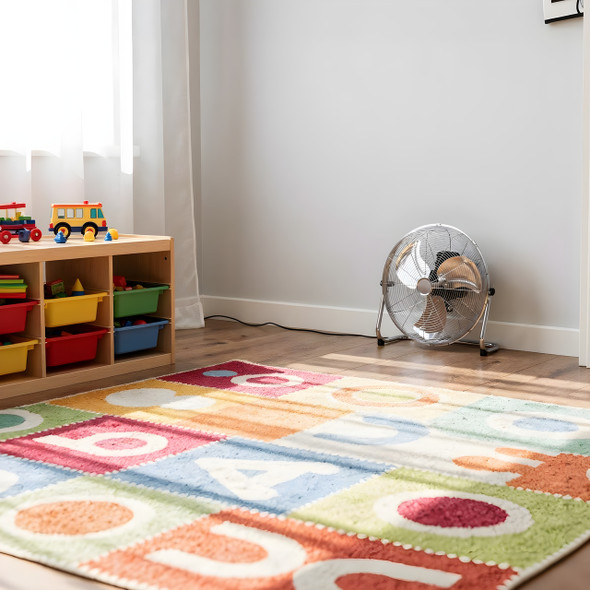 18 inch chrome floor fan in a children's playroom providing quiet cooling airflow